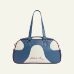 Le sac de voyage bleu