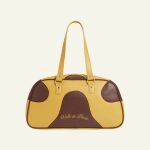 Le sac de voyage jaune